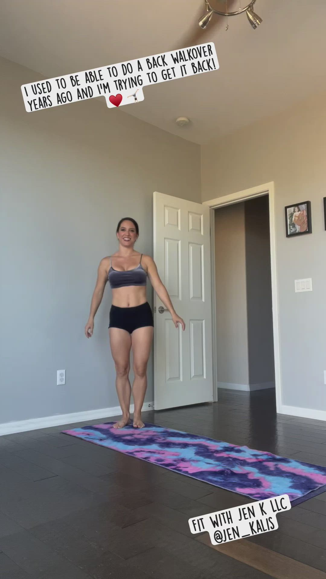 This may contain: a woman standing on top of a yoga mat with her arms in the air and two signs above her