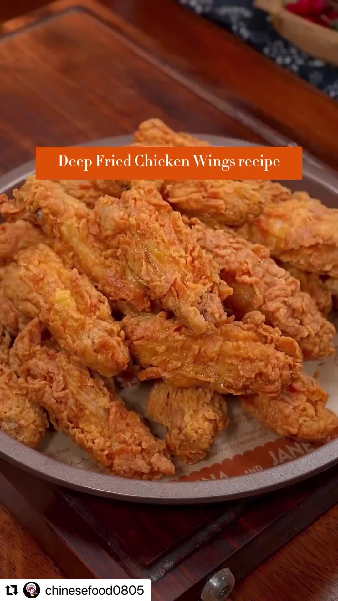 This may contain: fried chicken wings on a plate with the words deep fried chicken wings recipe