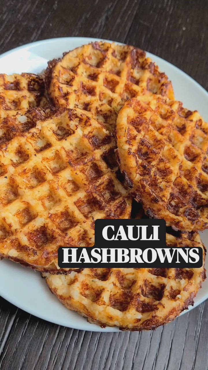 This may contain: three waffles on a white plate with the words cauli hashbrowns