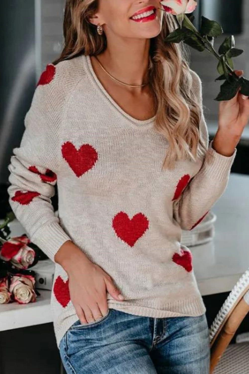 Elevate your style with our Women's New Loose Love V-Neck Knitted Pullover Sweater. This trendy sweater features a relaxed, loose fit and an alluring V-neck design with a lovely "Love" motif. Perfect for various occasions, it's the ideal addition to your wardrobe for a chic and confident look that exudes style and charm.