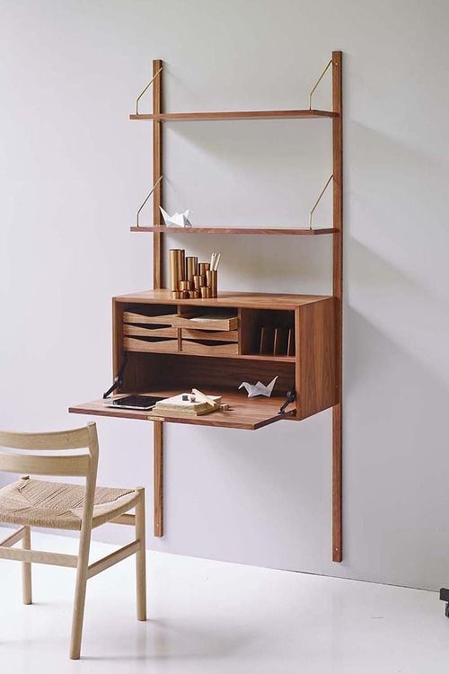 Minimalist wooden bureau with a folding desk top.