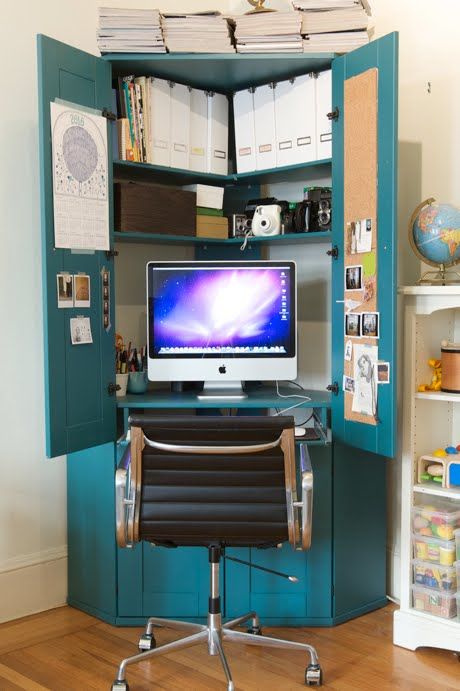 Corner armoire hiding a desk.