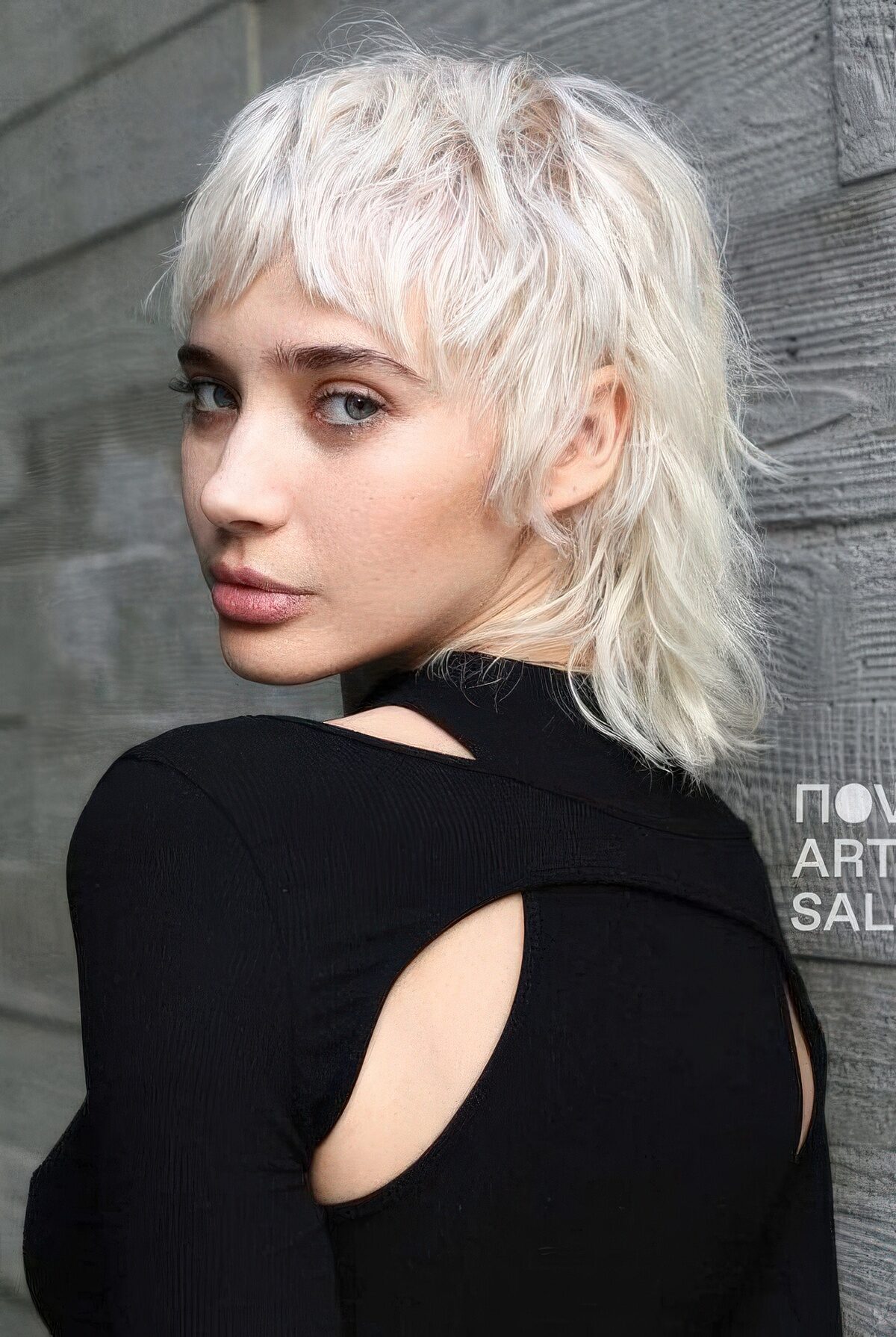 A cool and shaggy icy blonde mullet with fringe and bottleneck bangs is a very chic and cool idea.