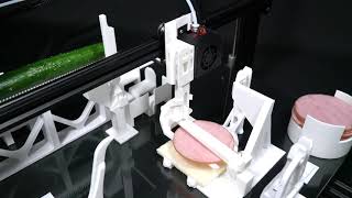 3D printer makes a sandwich.