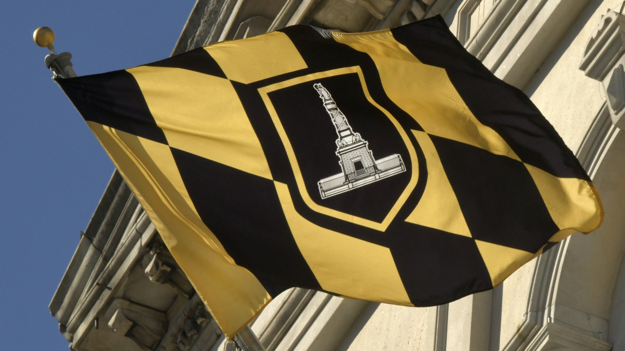 Baltimore City Hall with city flag, 100 Holliday Street