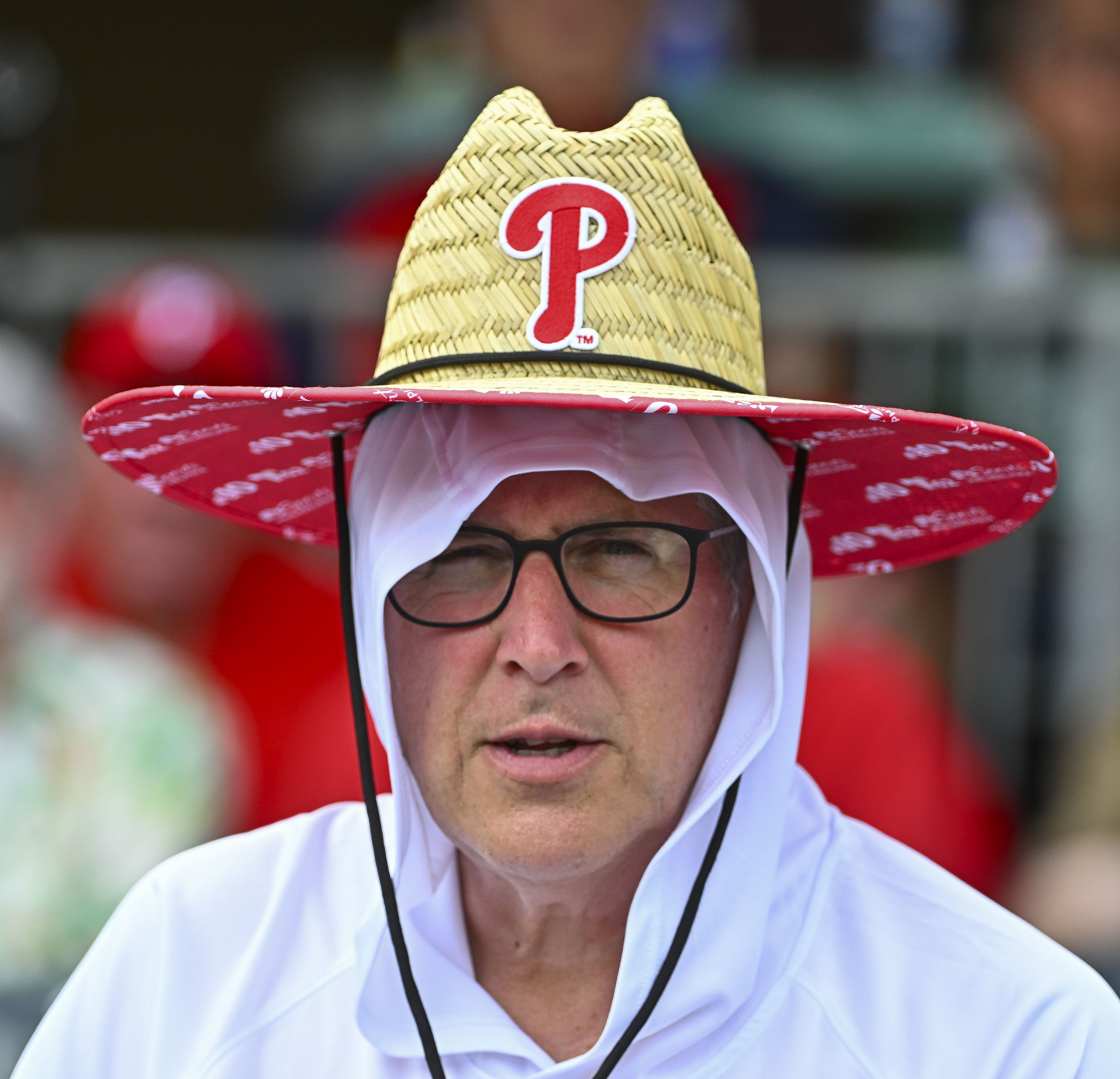 Tom Leakan of Somerdale, New Jersey, tries to keep cool as he watches watches an IronPigs baseball game Tuesday, July 9, 2024, at Coca-Cola Park in Allentown. (April Gamiz/The Morning Call)