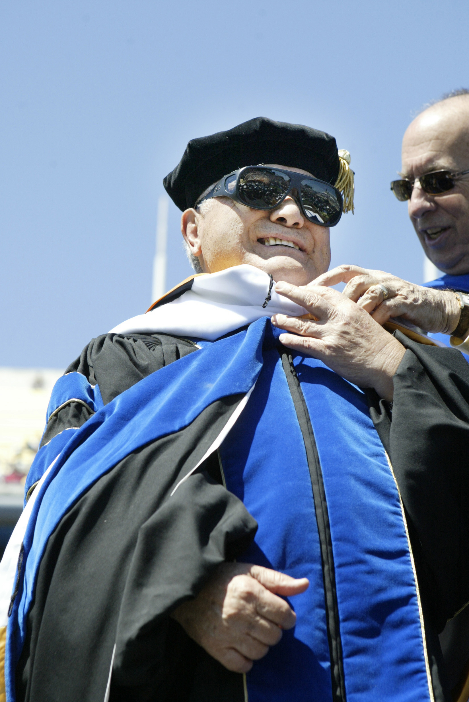 Yosh Uchida, a well-known San Jose Japanese American for his activities in the Japanese sport, judo, and in the Japanese American community receives his honorary doctorate at San Jose State University's 147th graduation ceremony, Saturday May 29, 2004, at Spartan Stadium. (Richard Koci/Mercury News)