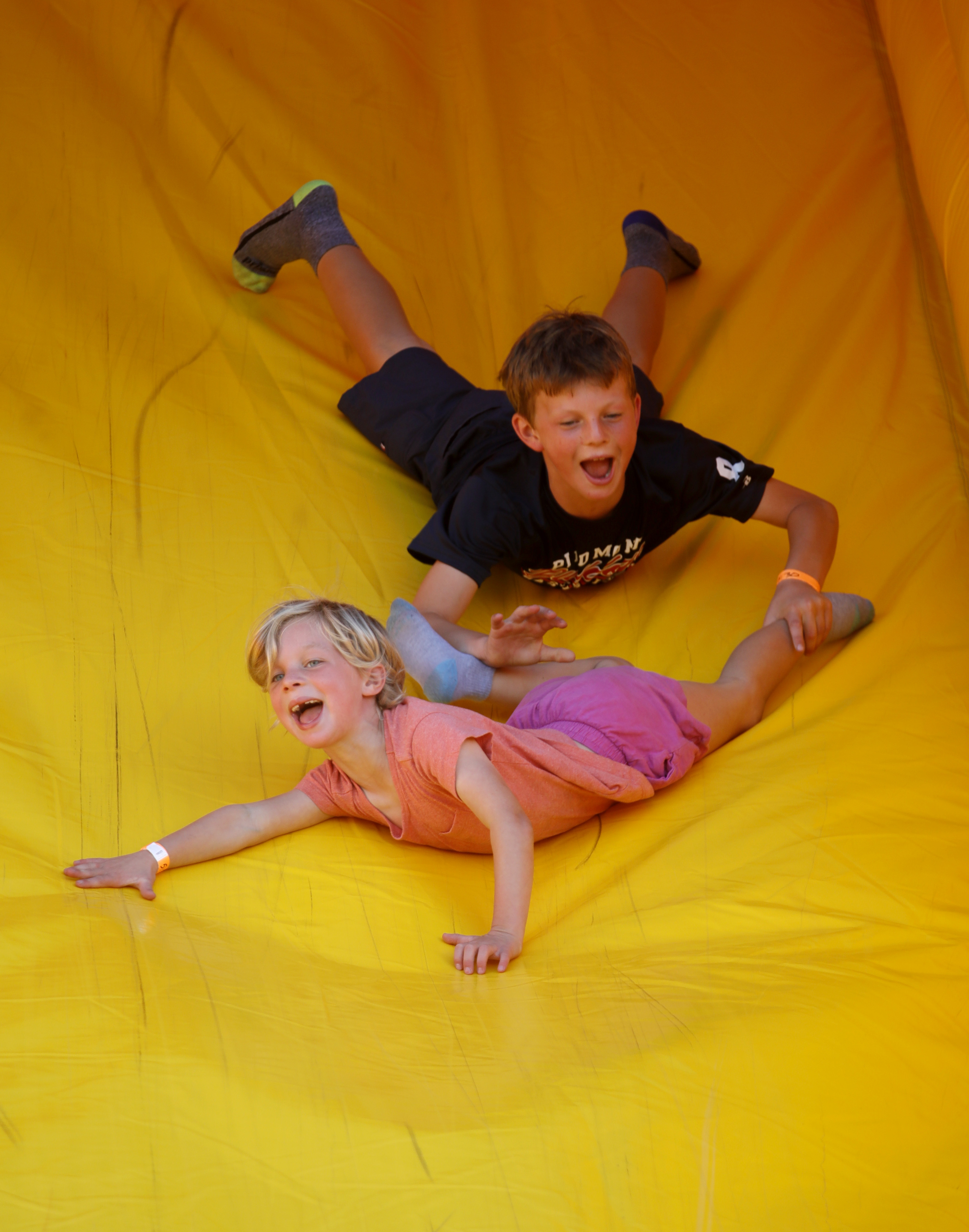 Willa Bell, 6, and her brother Cormac, 9, try out a giant inflatable slide at ABC Tree Farms & Pick of the Patch in San Lorenzo, Calif., on Monday, Oct. 23, 2023. (Jane Tyska/Bay Area News Group)