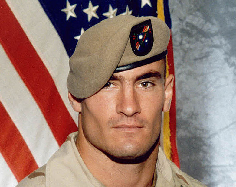 Pat Tillman, poses in a June 2003 photo, released by Photography Plus. Tillman, a Former Arizona Cardinals football player, was killed at age 27 by friendly fire in a firefight in Spera, Afghanistan as part of the U.S. Army Second Ranger Battalion.(AP Photo/Photography Plus via Williamson Stealth Media Solutions)