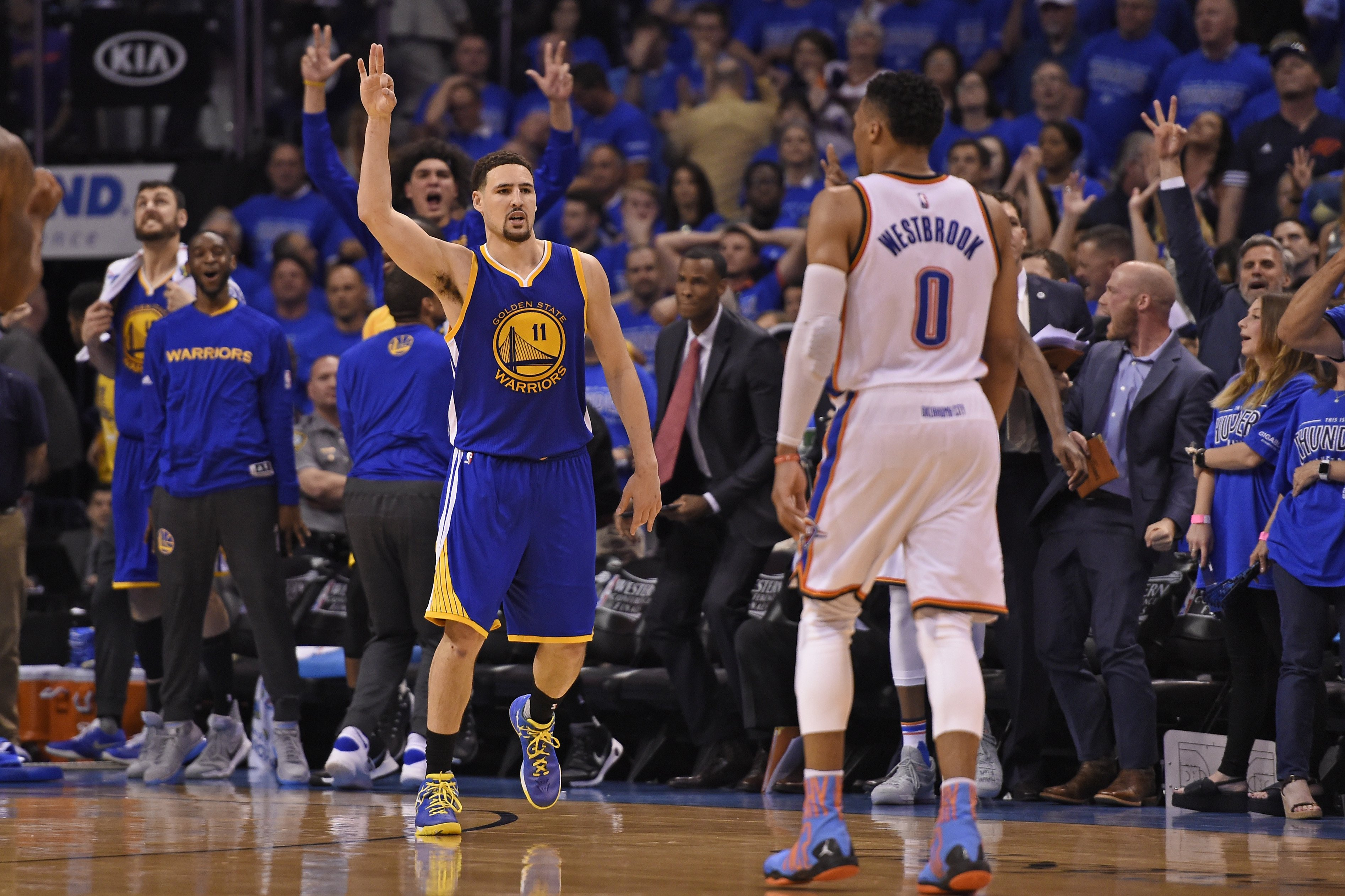 Golden State Warriors' Klay Thompson (11) gestures after scoring a three-point basket against the Oklahoma City Thunder in the fourth quarter of Game 6 of the NBA Western Conference finals at Chesapeake Energy Arena in Oklahoma City, Okla., on Saturday, May 28, 2016. Golden State defeated Oklahoma City 108-101. (Jose Carlos Fajardo/Bay Area News Group)