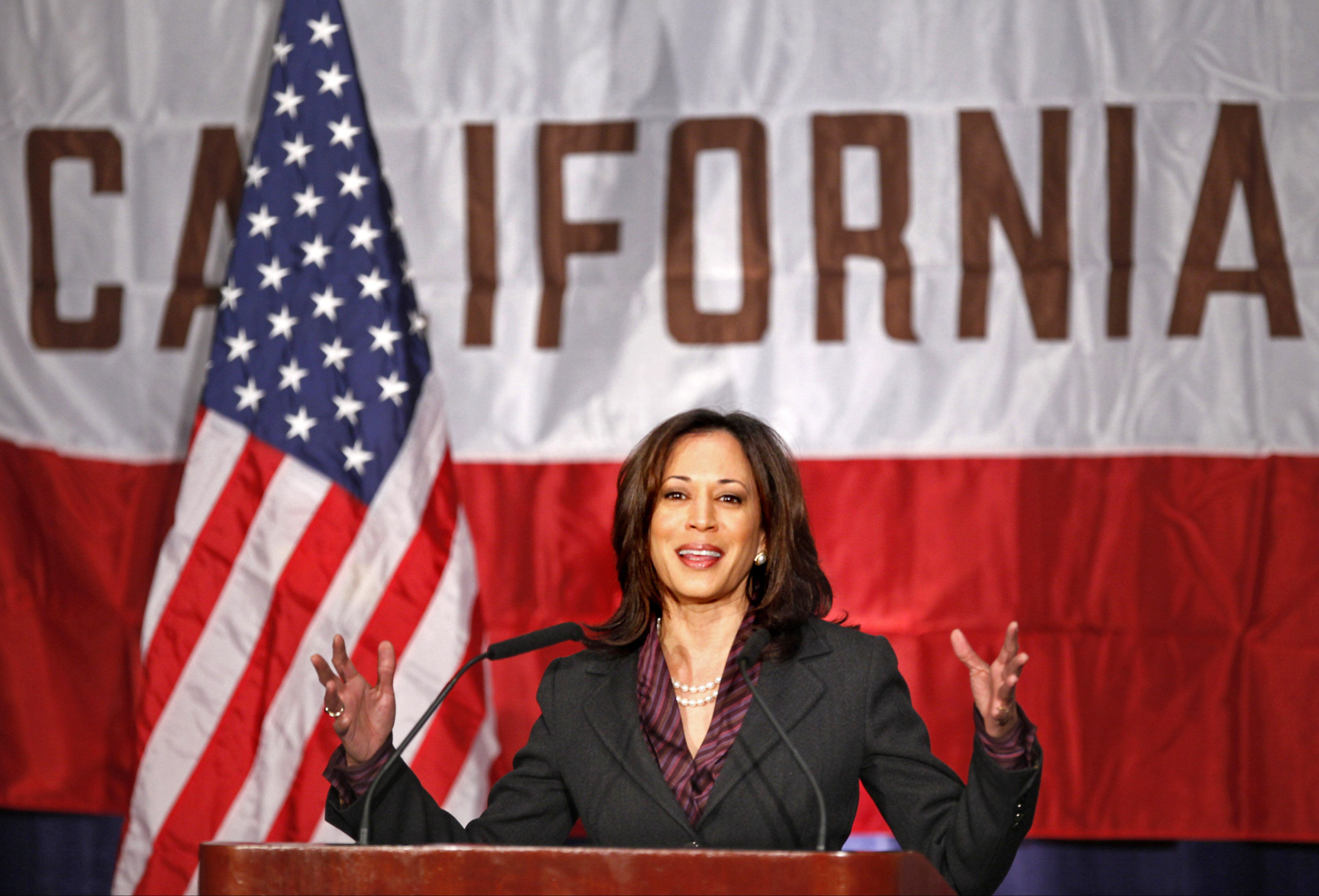 File photo from Nov of 2010, California Attorney General Kamala Harris gives her first news conference in Los Angeles. (AP Photo/Damian Dovarganes, File)