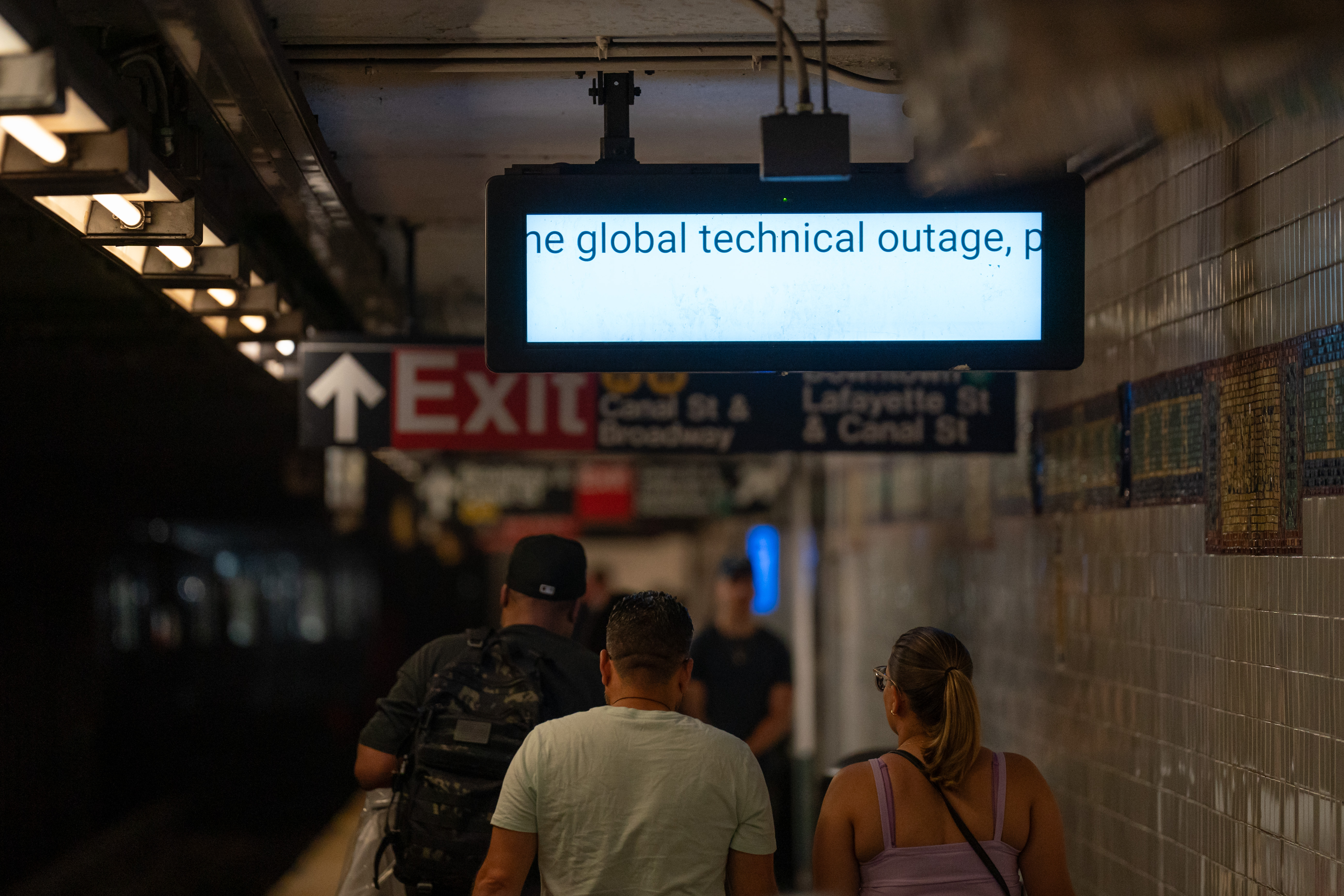 An information screen informs travelers that train information is not running due to the global technical outage at Canal Street subway station on July 19, 2024 in New York City. Businesses and transport worldwide were affected by a global technology outage that was attributed to a software update issued by CrowdStrike, a cybersecurity firm whose software is used by many industries around the world. (Photo by Adam Gray/Getty Images)