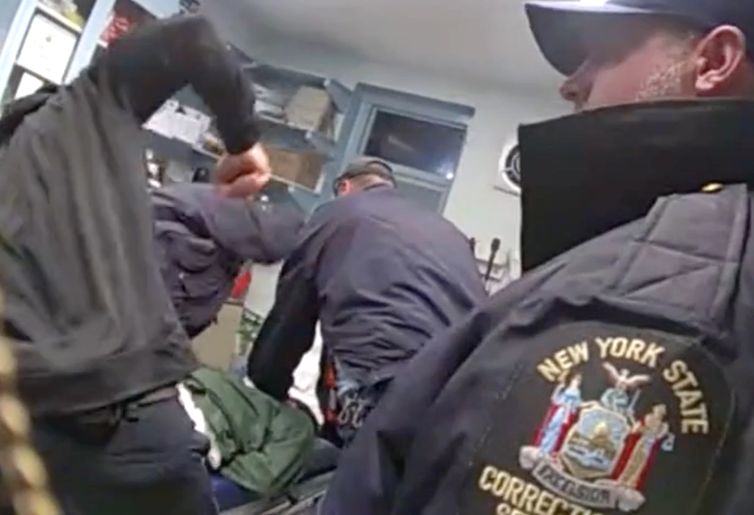 Body camera footage shows officers beating inmate Robert Brooks.