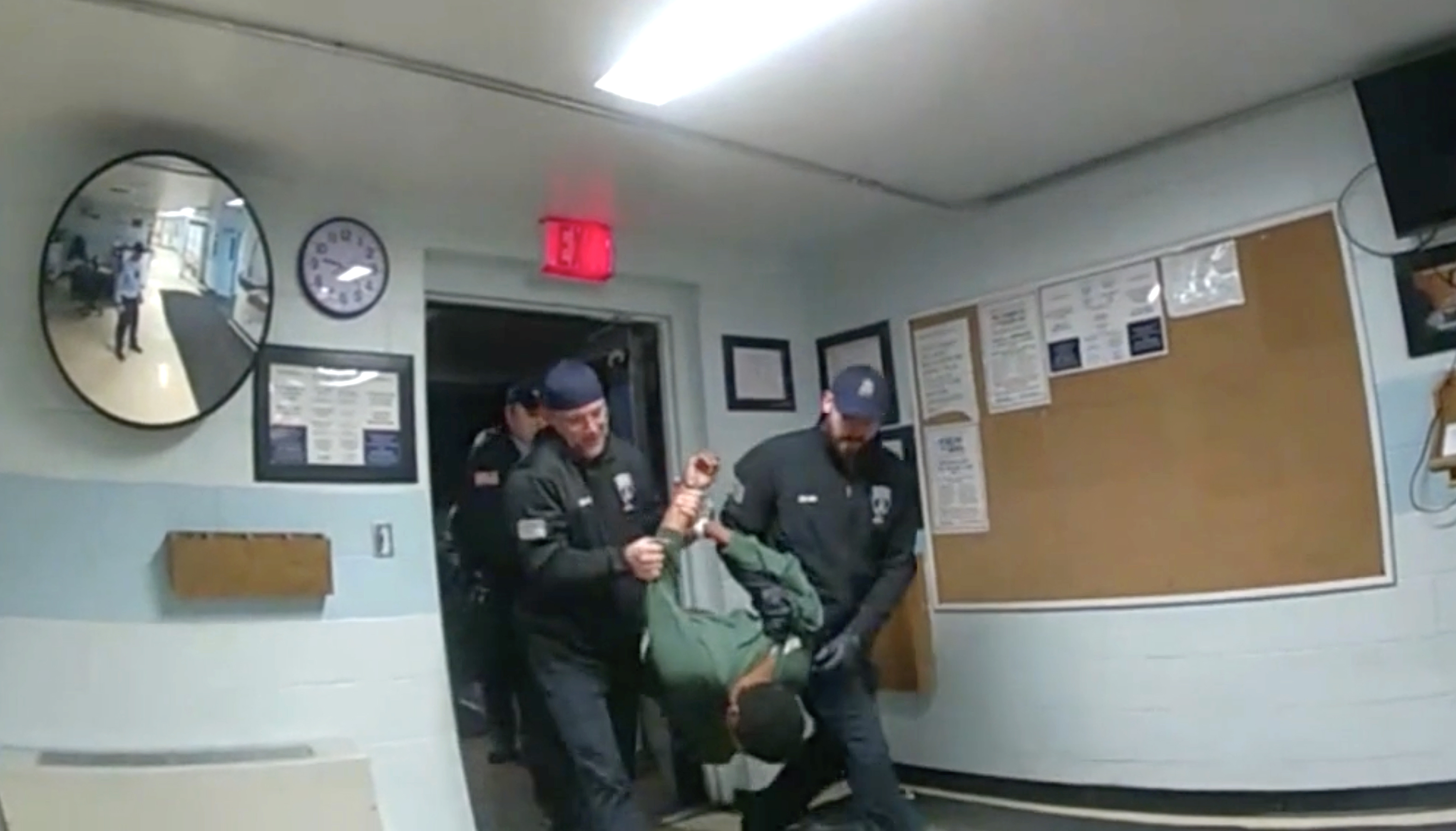 Body camera footage shows officers beating inmate Robert Brooks.