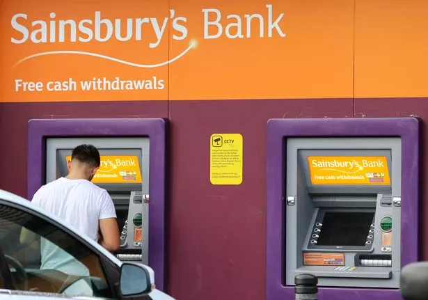 Man outside Sainsbury's bank