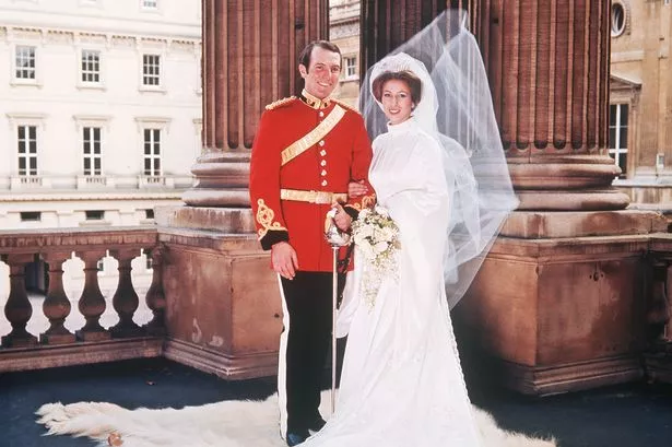 Princess Anne and Captian Mark Phillips on balcony of Buckingham Palace after Royal Wedding