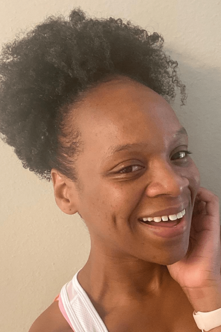 margo-no-makeup-smiling-natural-hair-pulled-in-puff-busy-yoga-mom