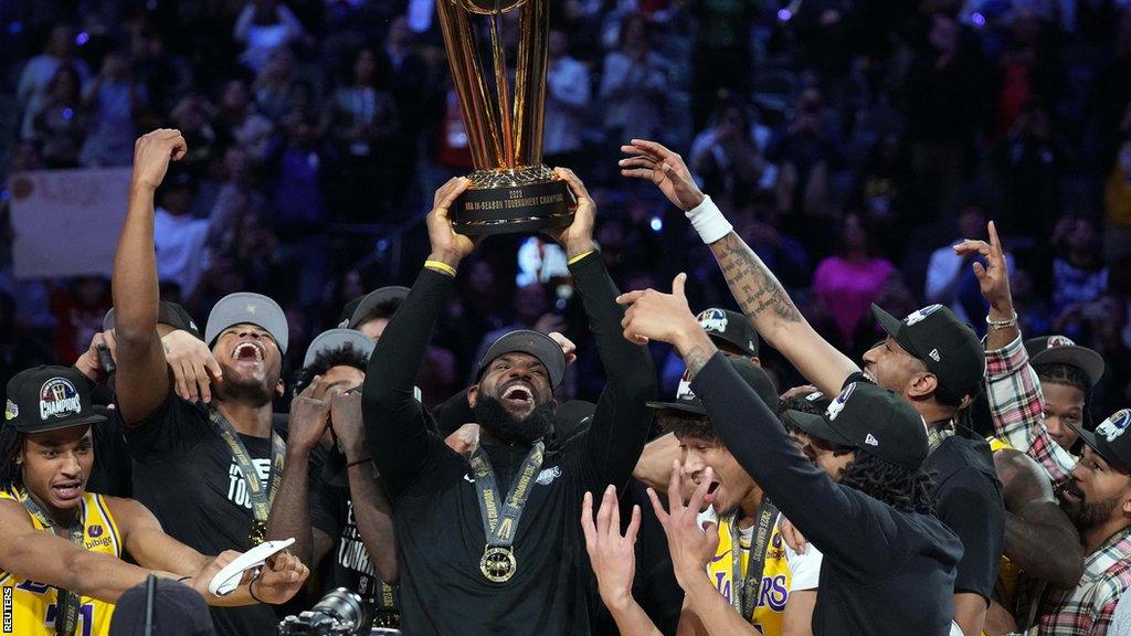 LeBron James and the LA Lakers celebrate winning the inaugural in-season NBA tournament