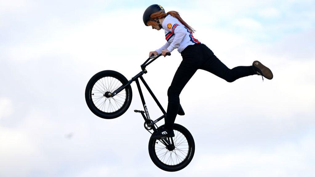 Sasha Pardoe jumping on her bike