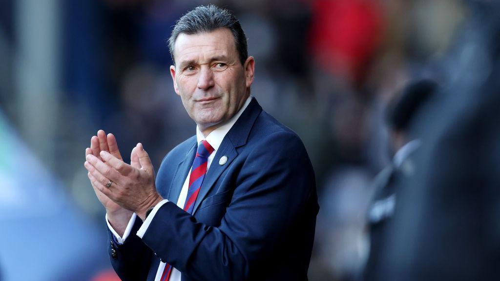 Tommy Widdrington, Manager of Aldershot Town, looks on prior to the Emirates FA Cup Third Round match between West Bromwich Albion and Aldershot Town 