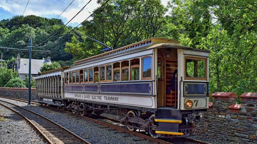 A tram on the tracks arriving into Laxey