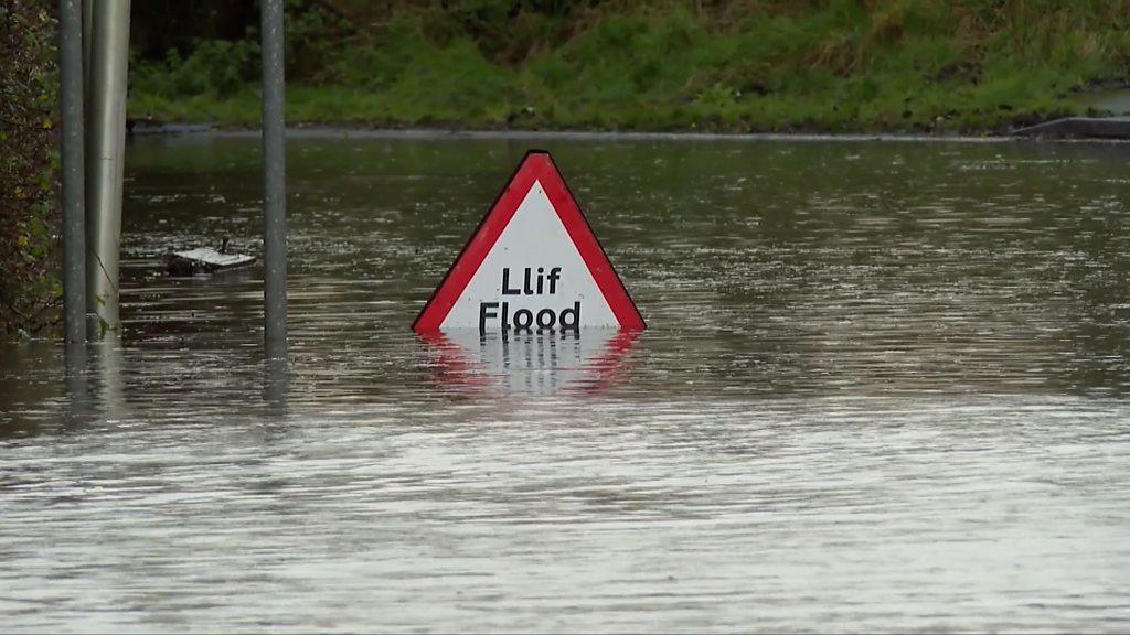 Flood sign in flood water