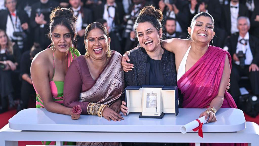 Kani Kusruti, Chhaya Kadam, Payal Kapadia and Divya Prabha pose with the Grand Prix Award for All We Imagine As Light during the closing ceremony at the 77th annual Cannes Film Festival on May 25, 2024 in Cannes