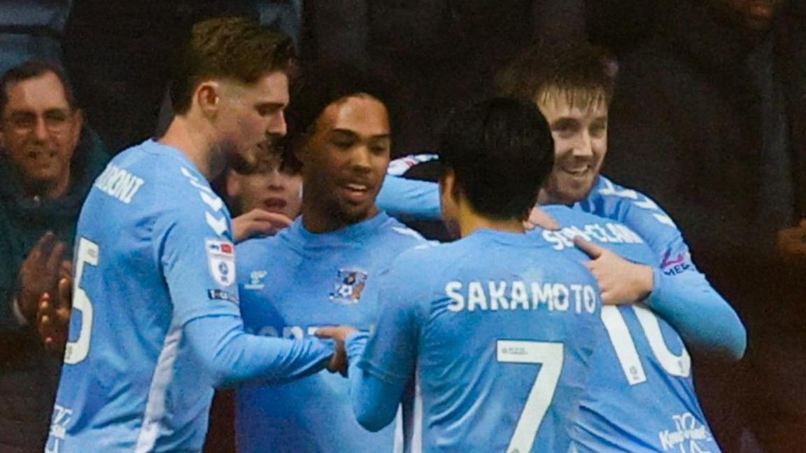 Coventry City players celebrate one of their four first-half goals against Plymouth Argyle