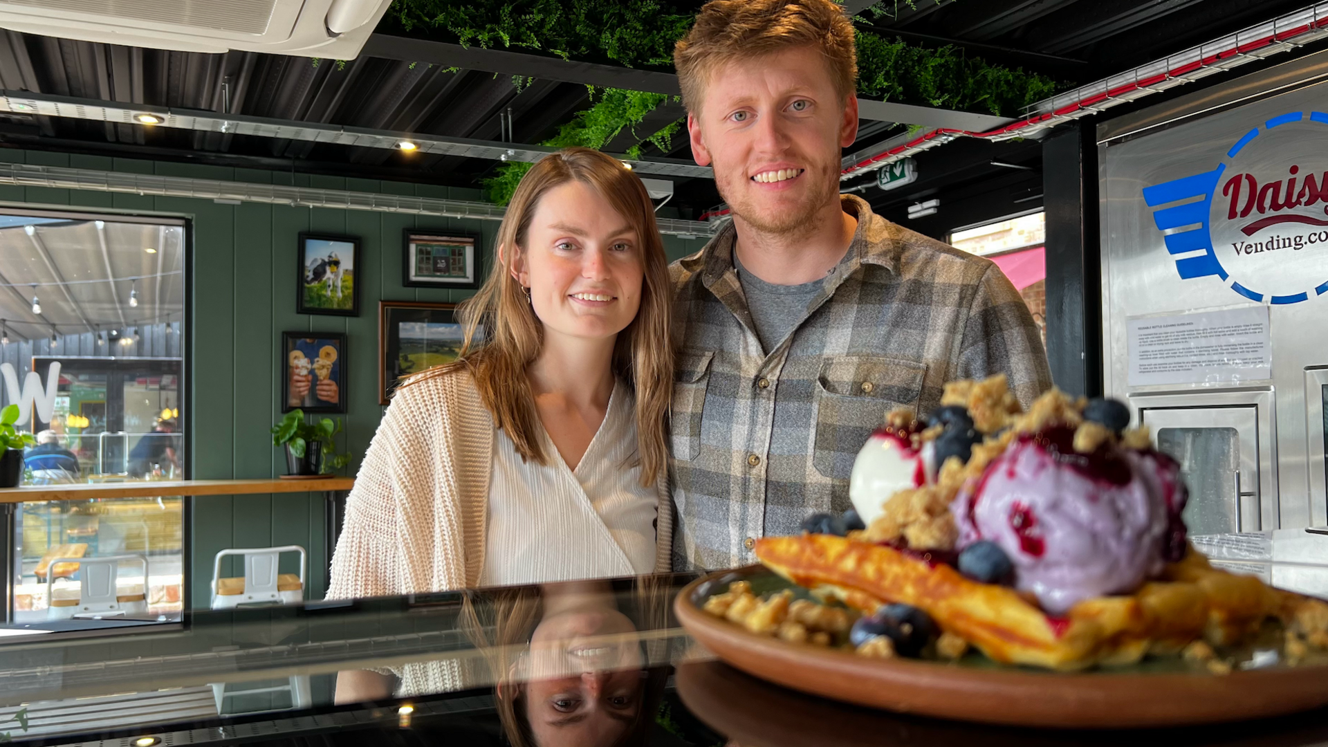 Will and Emily Lee stand behind their signature ice-cream on a waffle, made from milk on their Gloucestershire dairy farm.