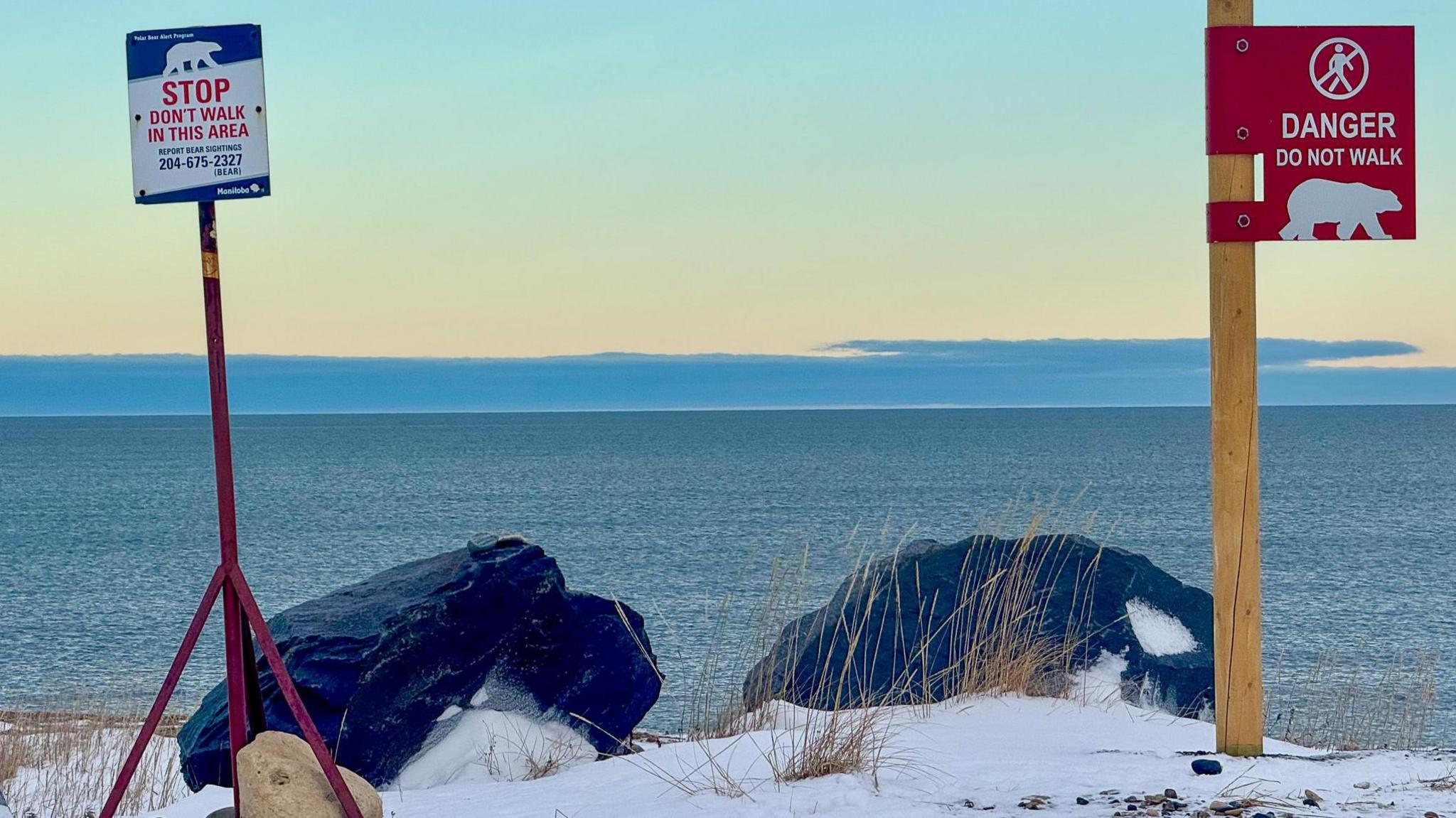 Polar bear warning signs by the bay in Churchill, Manitoba 