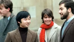 The future emperor (second left) and Keith George (right) as student friends