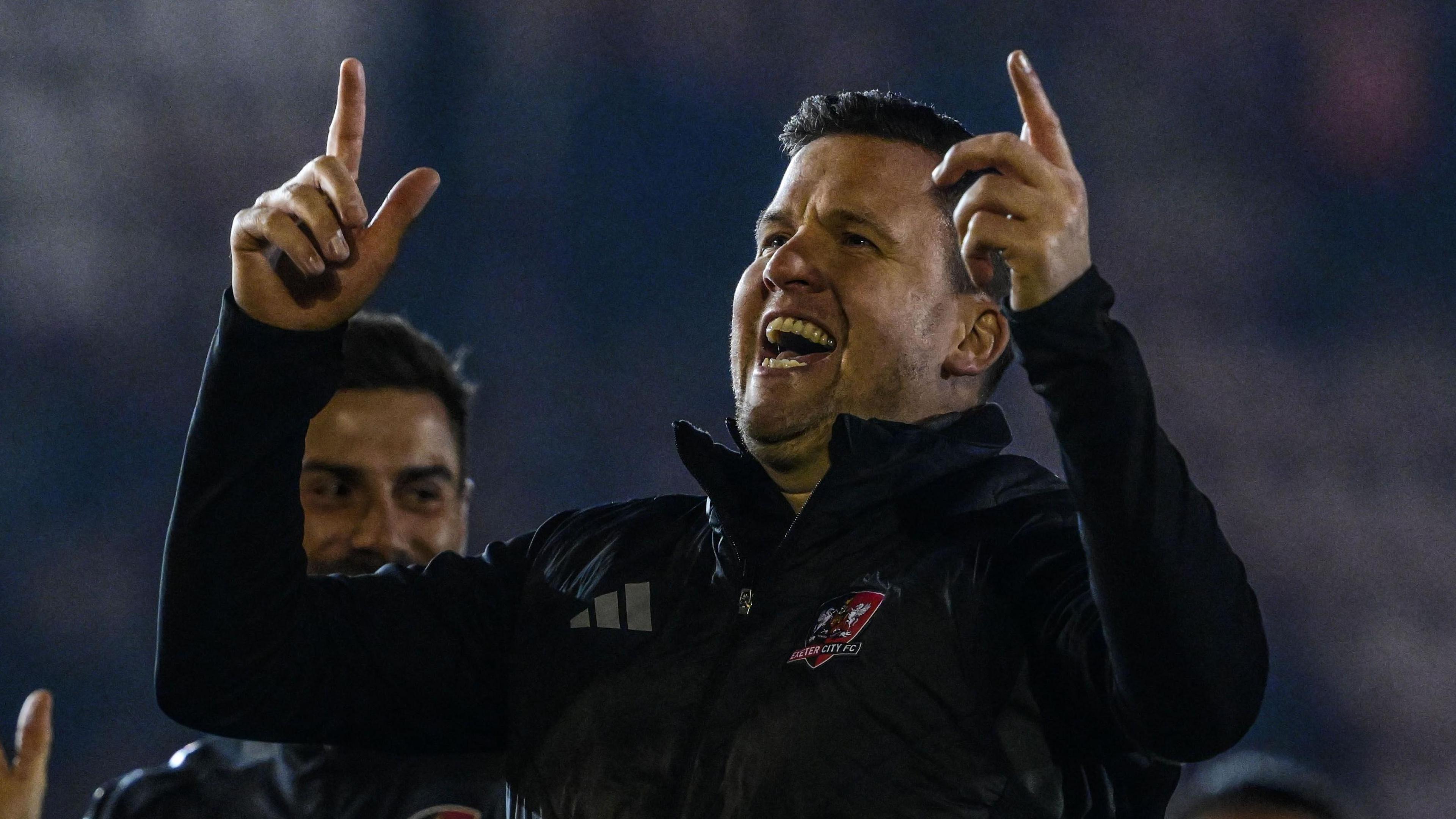 Gary Caldwell points to the sky