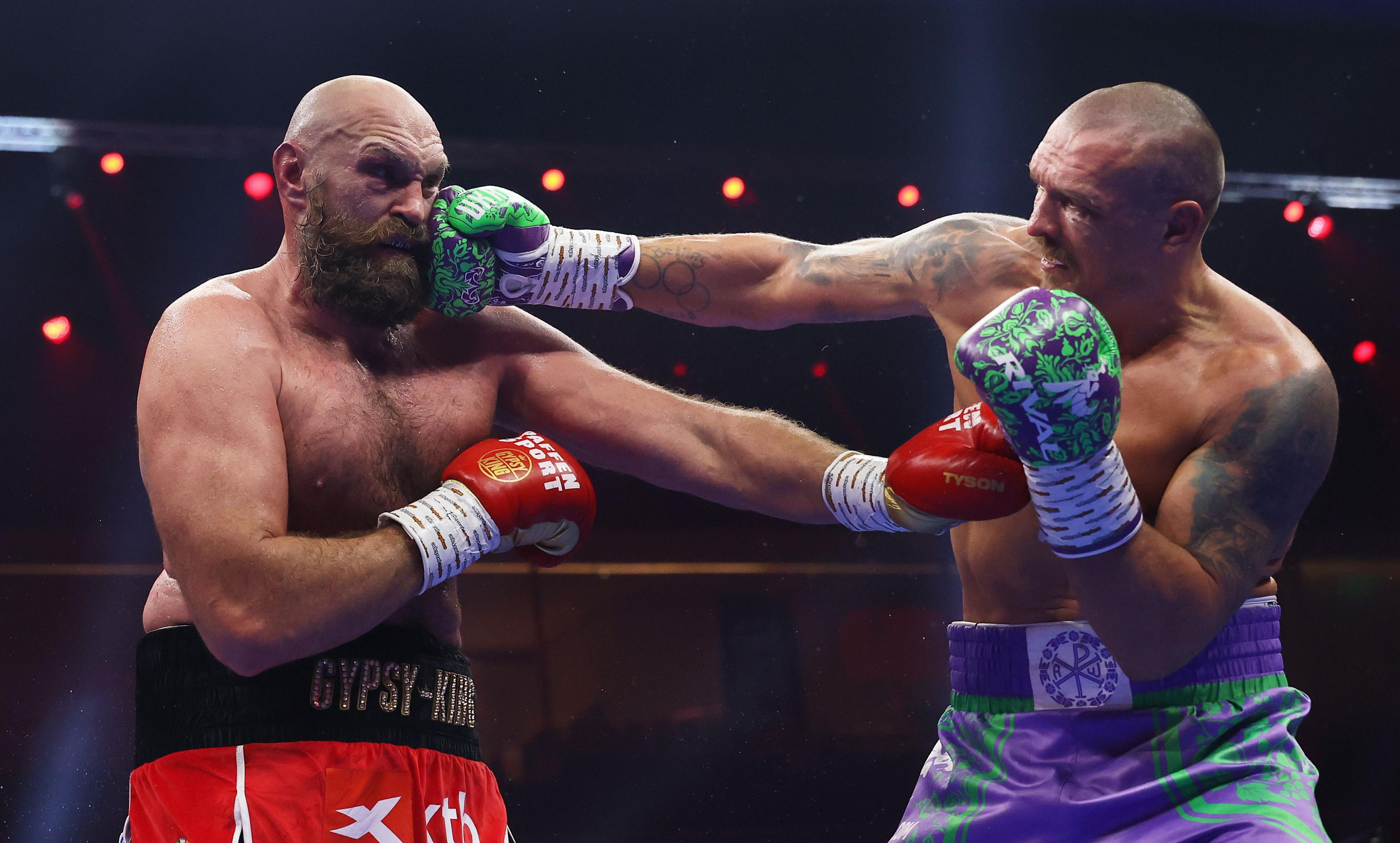 Oleksandr Usyk punches Tyson Fury during the Undisputed World Heavyweight titles' fight in Riyadh, Saudi Arabia