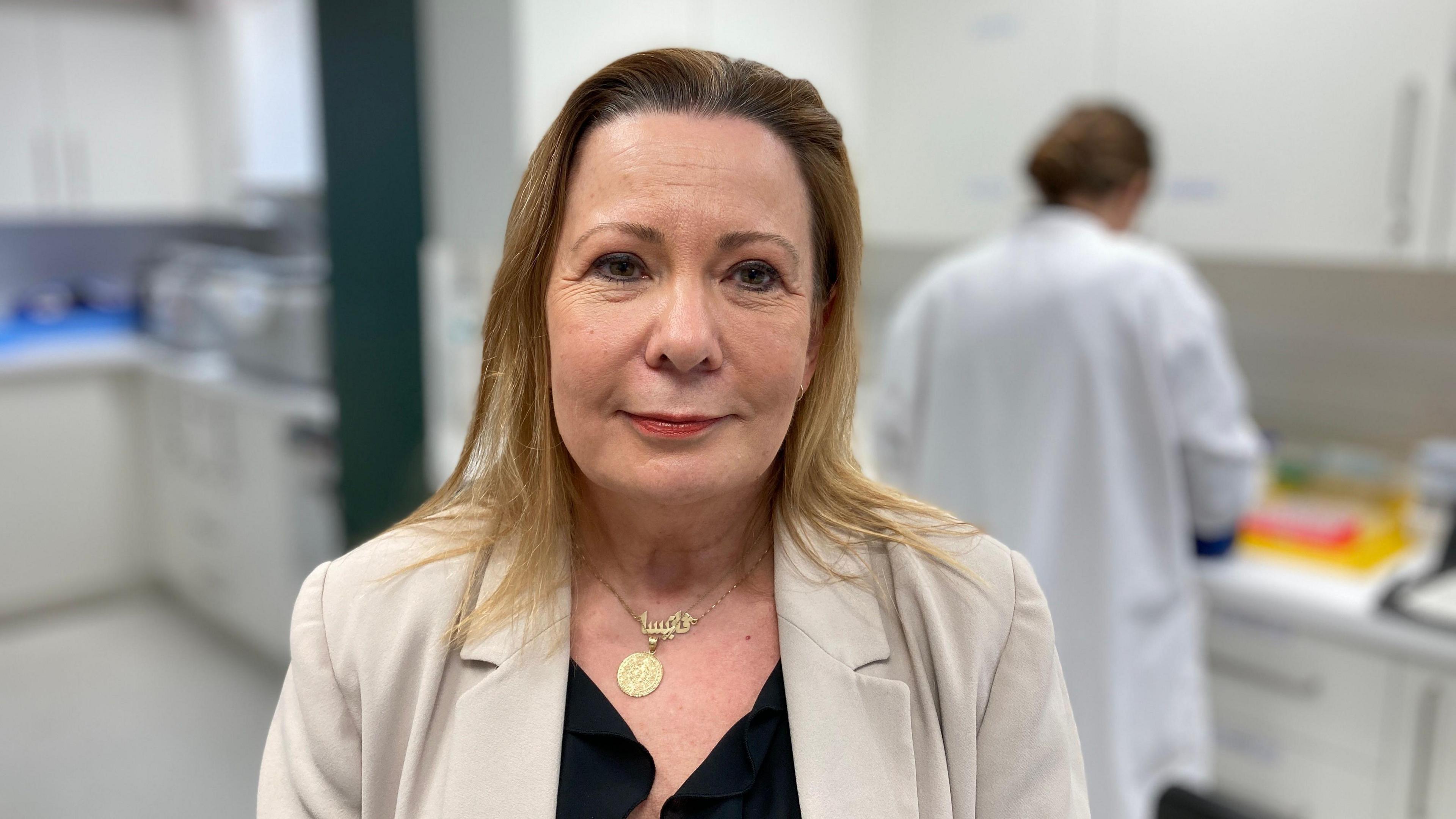 Professor Vanessa Raymont standing in a lab