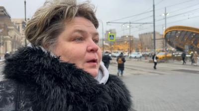 Woman in black fur coat speaking to the BBC Russia Editor Steve Rosenberg about her hopes for the future