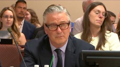 Alec Baldwin is seen listening to the judge