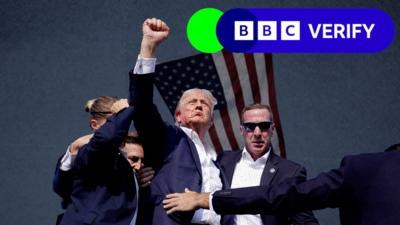 Composition image showing Donald Trump holdi up fist as he is escorted by Secret Service with American flag behind him