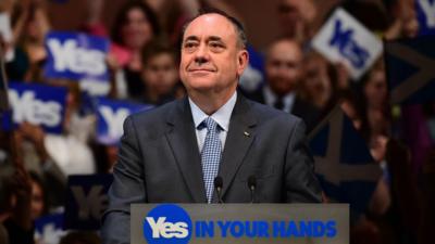 Alex Salmond standing at a podium during campaigning for the 2014 independence referendum.