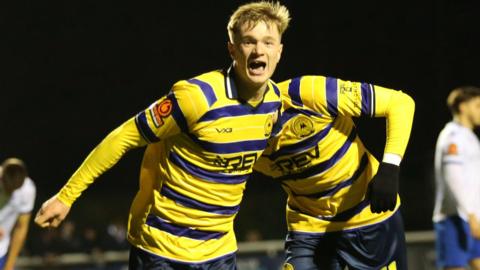 Will Jenkins Davies celebrates scoring for Torquay