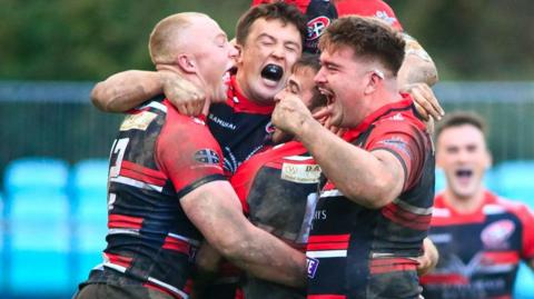 Cornish Pirates celebrate a try