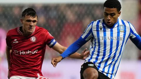 Bristol City and Sheffield Wednesday players challenge for the ball