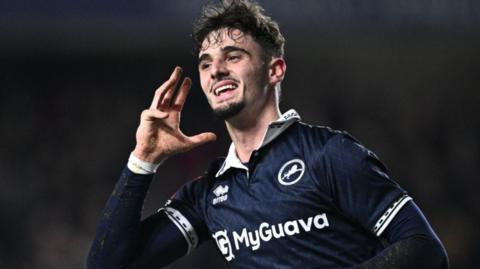 Millwall's Mihailo Ivanovic performs an Aleksandar Mitrovic-style celebration after scoring against Dagenham & Redbridge