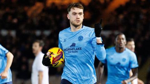 Crewe's Jack Lankester celebrates his equaliser at Port Vale