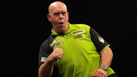 Michael van Gerwen celebrates winning a game at Premier League Darts night 11 in Birmingham