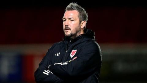 Matty Jones watches Wales U21 from the sidelines