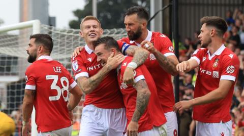 Wrexham players celebrate Jack Marriott's goal