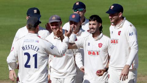 Shane Snater celebrates his first five-wicket haul in two years with his Essex team-mates