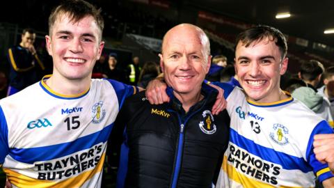 Ruairi, Peter and Darragh Canavan celebrate winning the Tyrone title