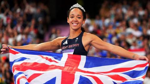 Katarina Johnson-Thompson celebrates after winning Olympic heptathlon silver