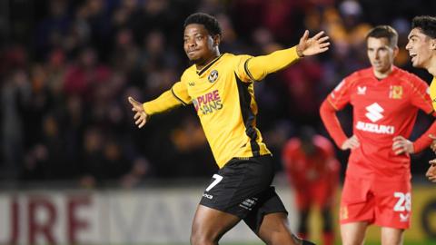 Bobby Kamwa celebrates against MK Dons